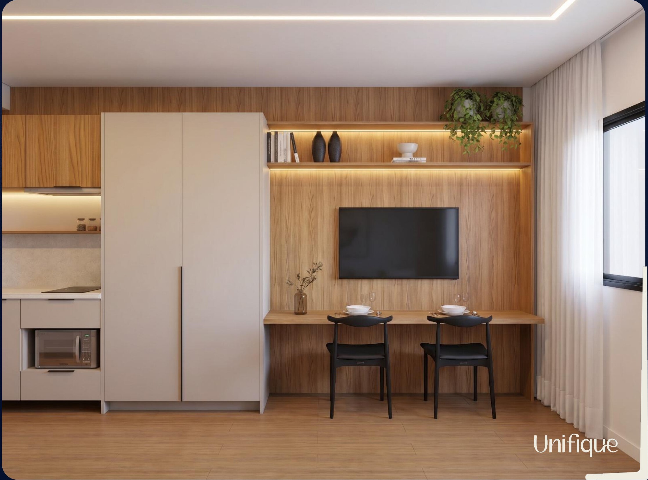 Área integrada com painel de TV e mesa